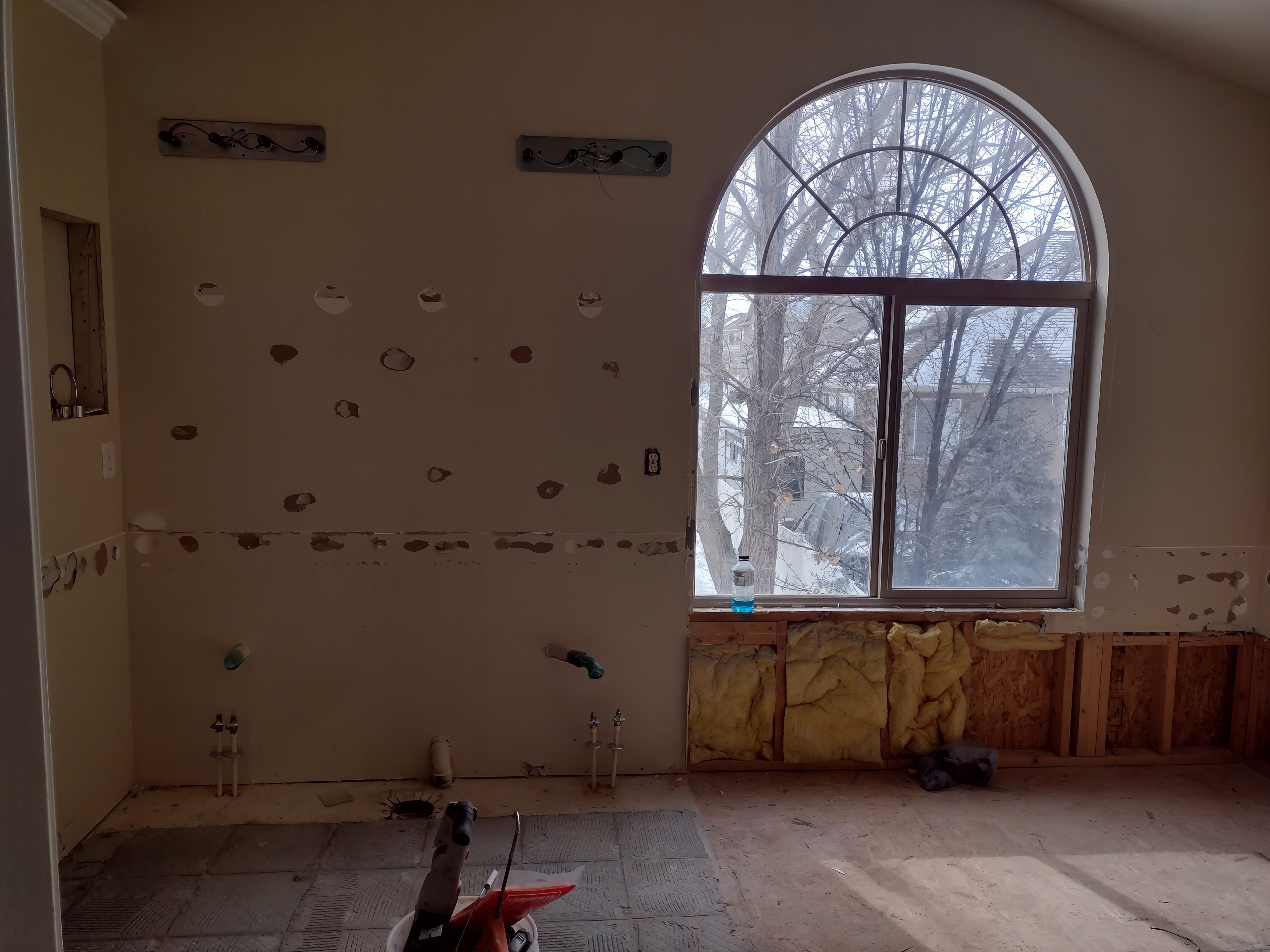 Bathroom plumbing and electrical phase before finishes