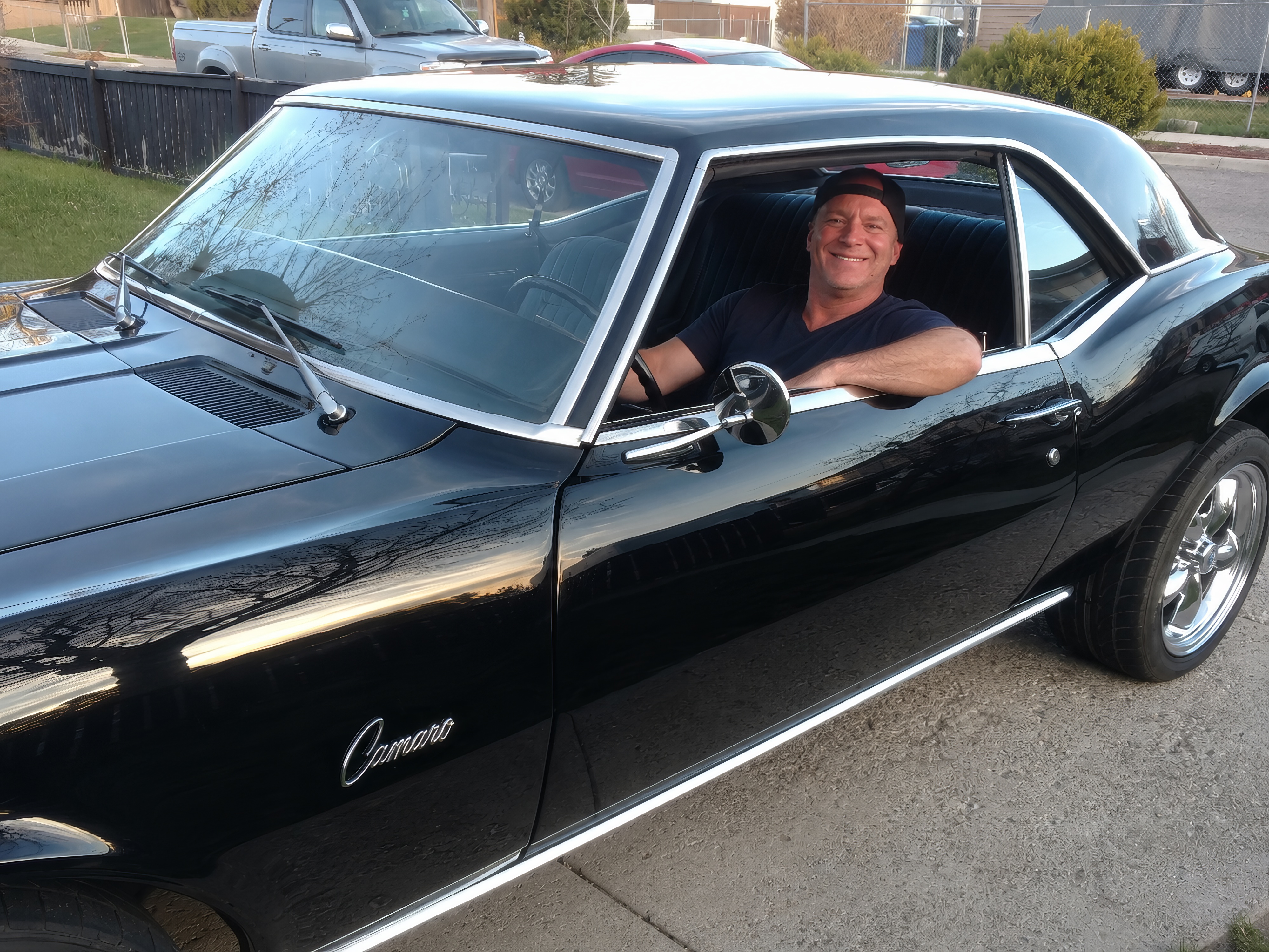 Patton Home Solutions owner with a rebuilt classic car